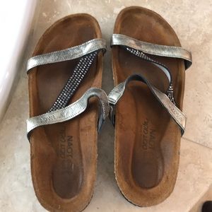 Noat metallic silver with rhinestones.